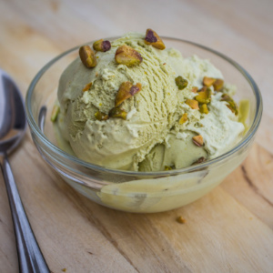 icecream topped with pistachio kernels